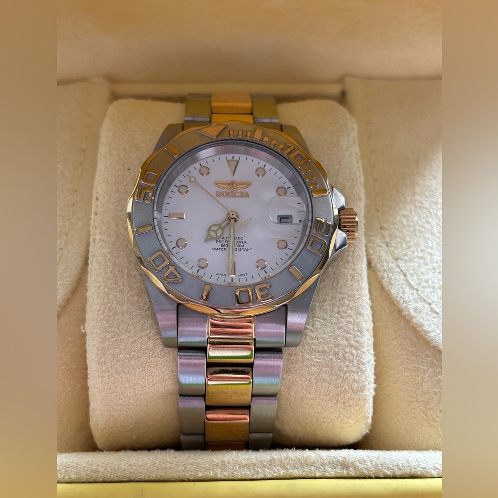 Invicta  pro diver watch stainless steel water resistant silver and gold colors